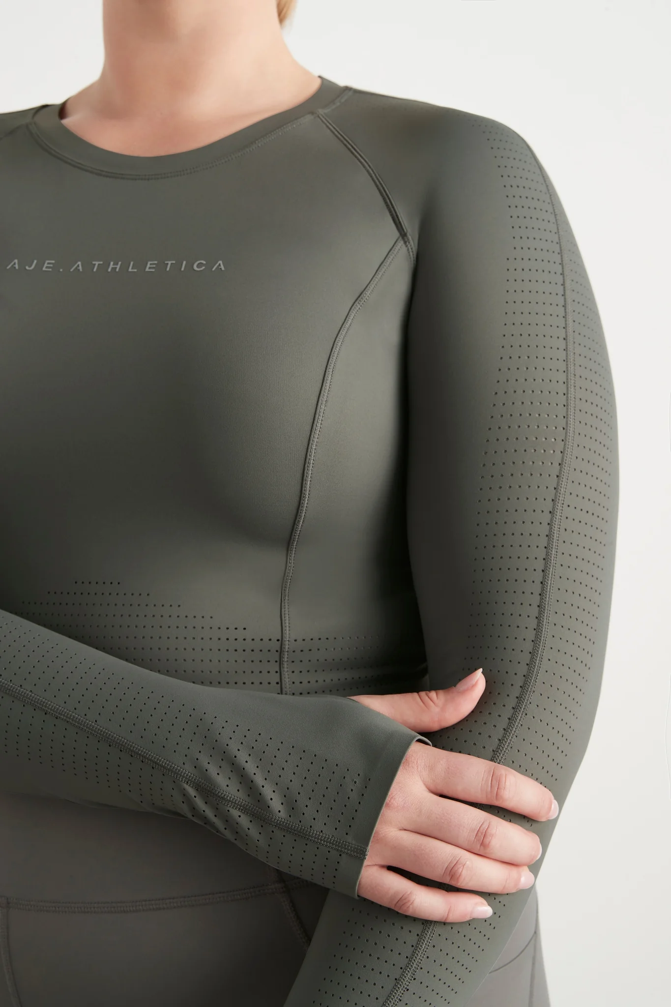 Perforated Long Sleeve Crop Top 340 12 Perforated Long Sleeve Crop Top 340